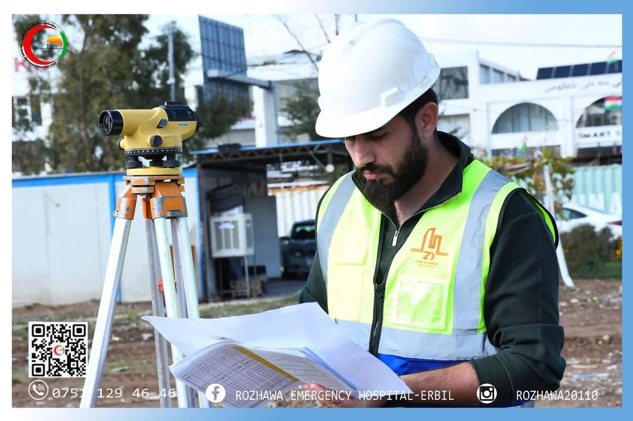 Engineer surveying site